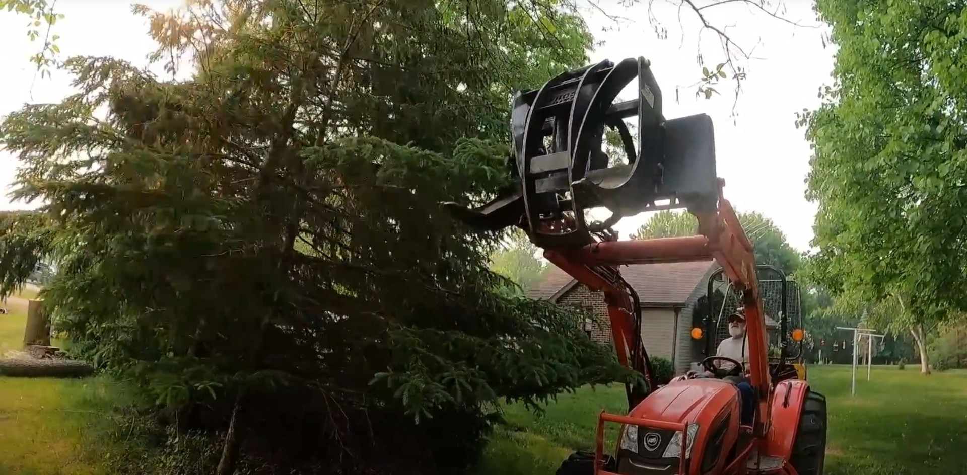 Modern Tree Service Equipment Professional tree service equipment including grapple attachment for efficient tree handling